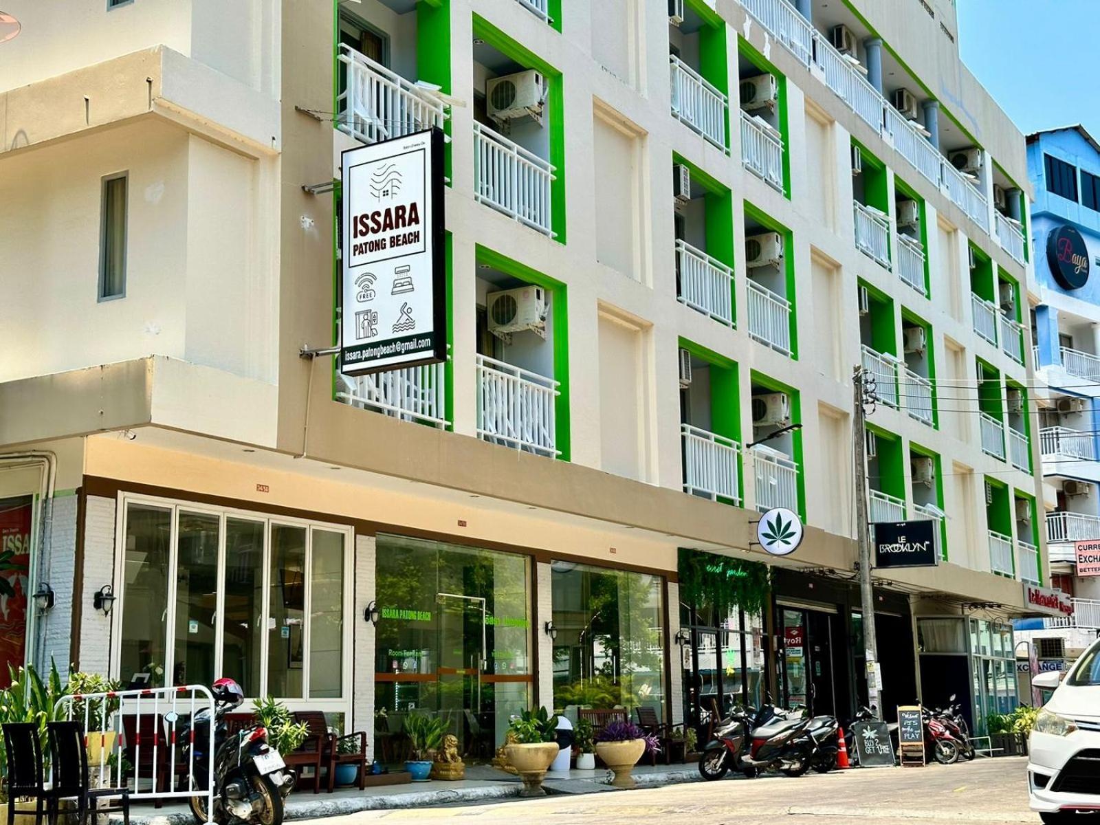 Issara Patong Beach Bagian luar foto