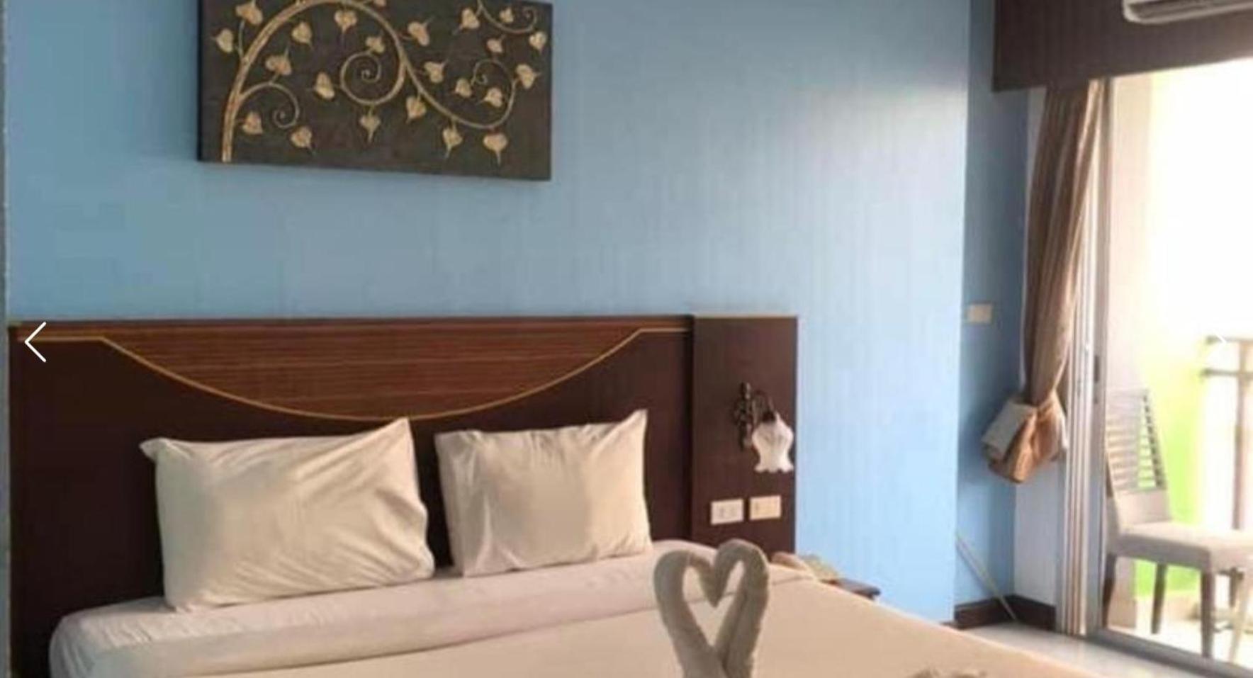 Issara Patong Beach Bagian luar foto