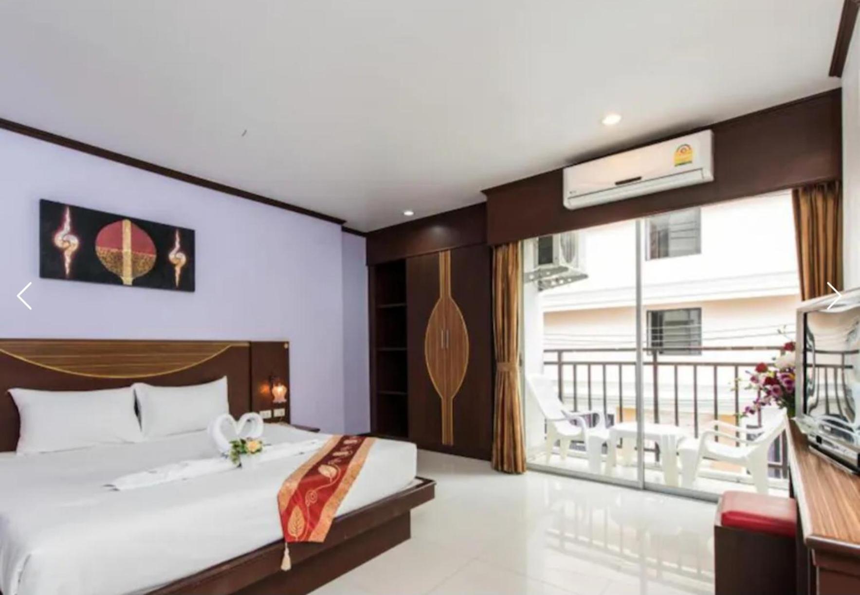 Issara Patong Beach Bagian luar foto