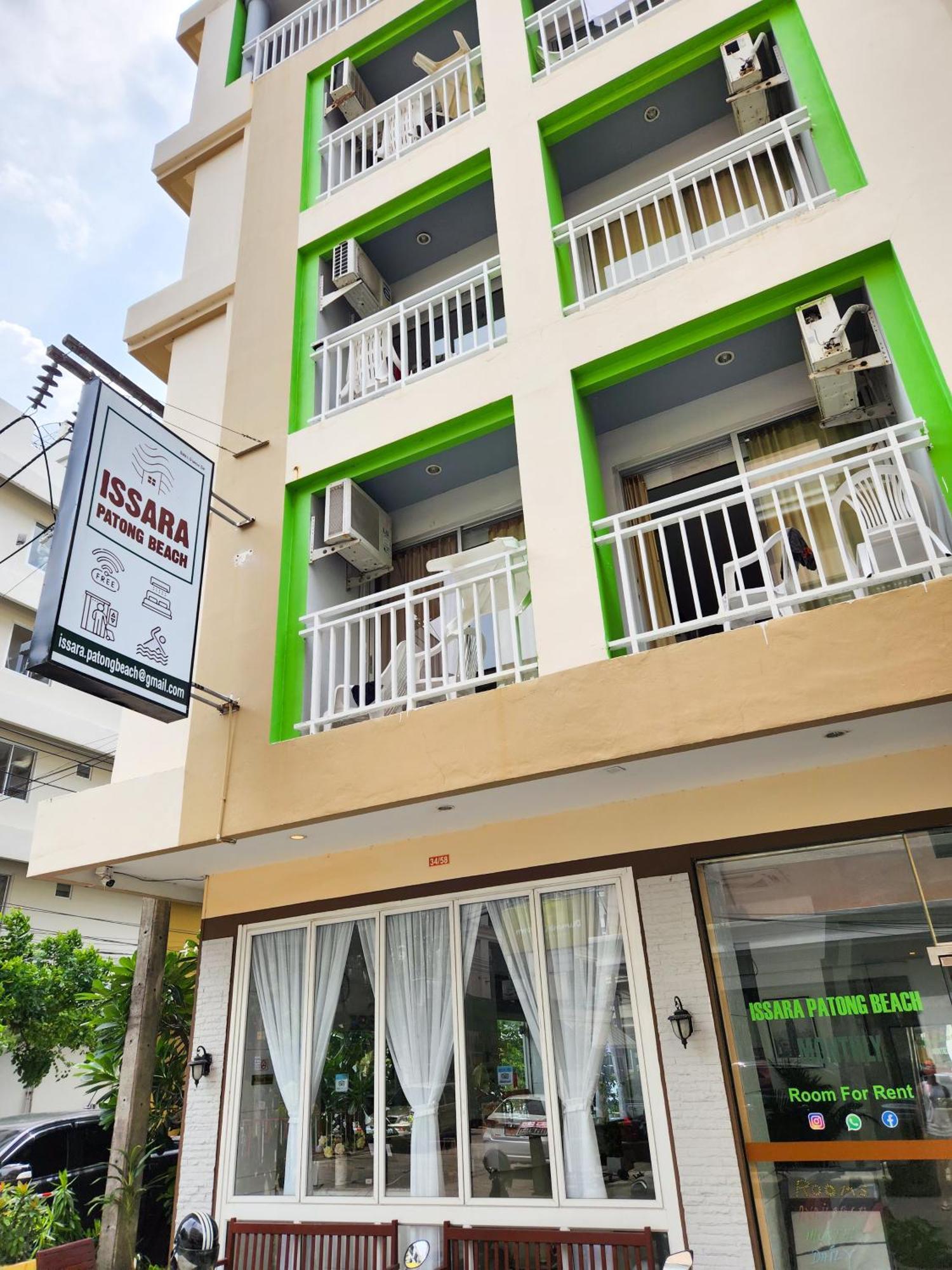 Issara Patong Beach Bagian luar foto